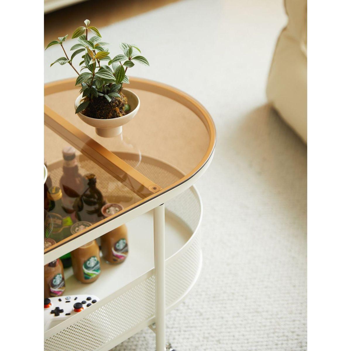 Movable oval metal glass coffee table with storage