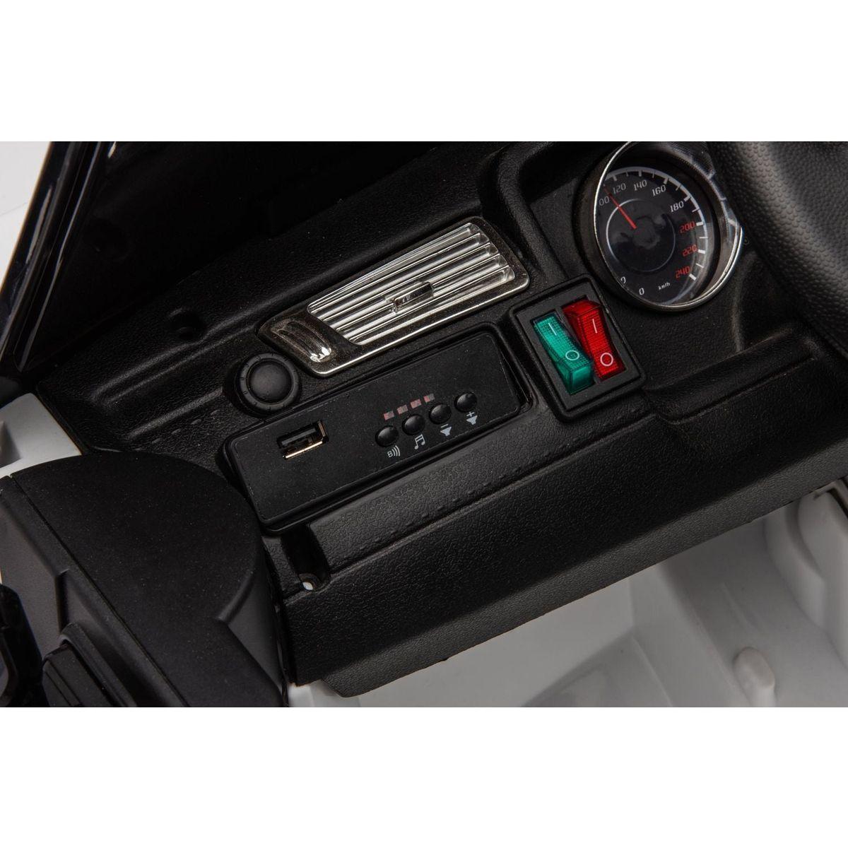 12v7a 30wx2 Four-wheel drive leather seat one button start,forward and backward, high and low speed, music, front light, power display, two doors can open, 2.4G R/C, seat belt four wheel absorber