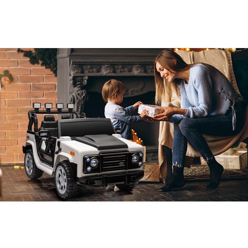 12v7a 30wx2 Four-wheel drive leather seat one button start,forward and backward, high and low speed, music, front light, power display, two doors can open, 2.4G R/C, seat belt four wheel absorber