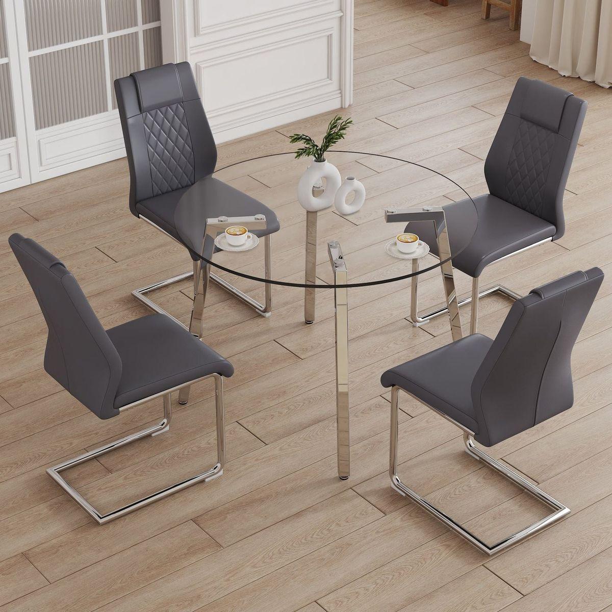 Table and chair set.A Modern Minimalist Style Round Clear Tempered Glass Table with silver Metal Legs.And 4 dark gray chairs with Modern PU Leather High Back Upholstered and C-Tube Chrome Legs.