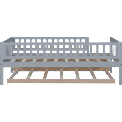 Twin Size Wood Daybed with Trundle and Fence Guardrails, Gray