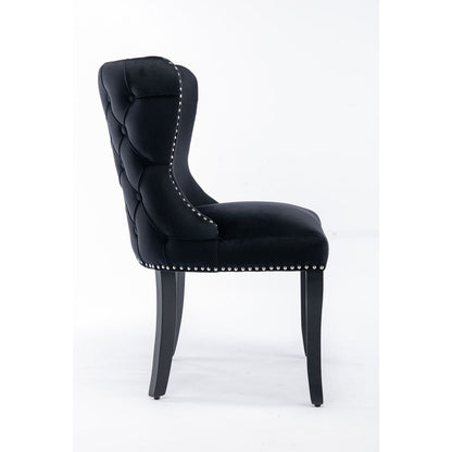 Set of 2 Black Velvet upholstered wing-back dining chair with backstitching nailhead trim and solid wood legs