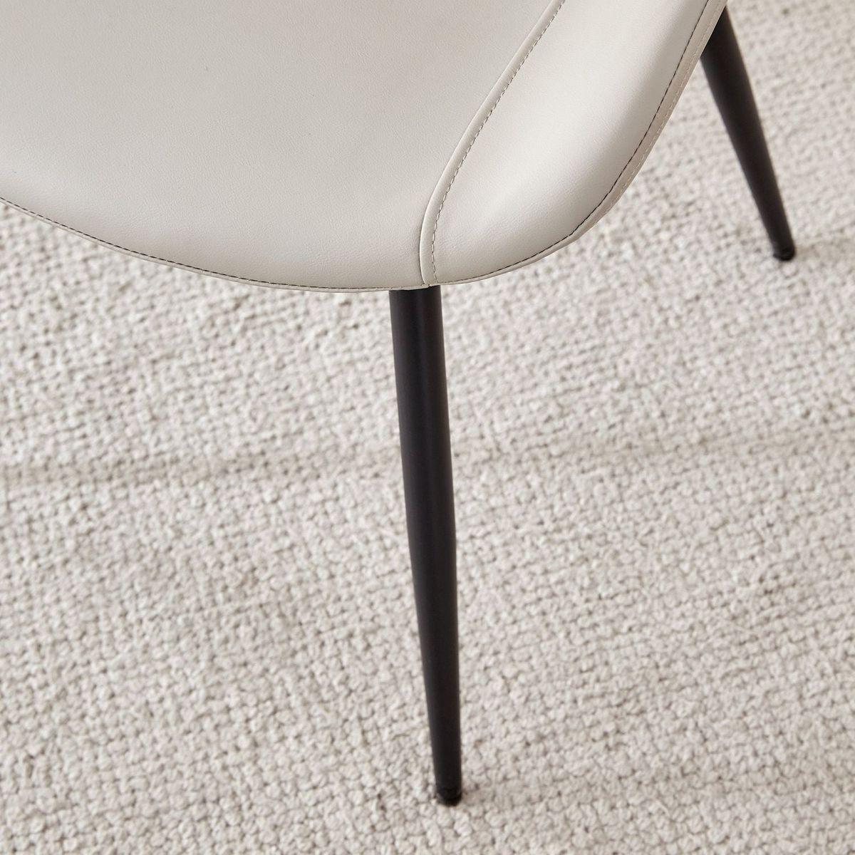Light gray artificial leather backrest cushion dining chair, black metal legs, curved widened cushion design for more comfort, suitable for restaurants, kitchens, bedrooms, offices.(6 chairs) 0502