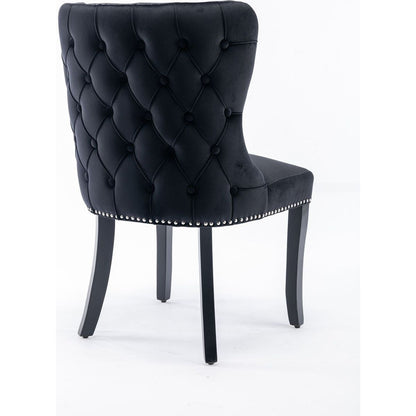 Set of 2 Black Velvet upholstered wing-back dining chair with backstitching nailhead trim and solid wood legs