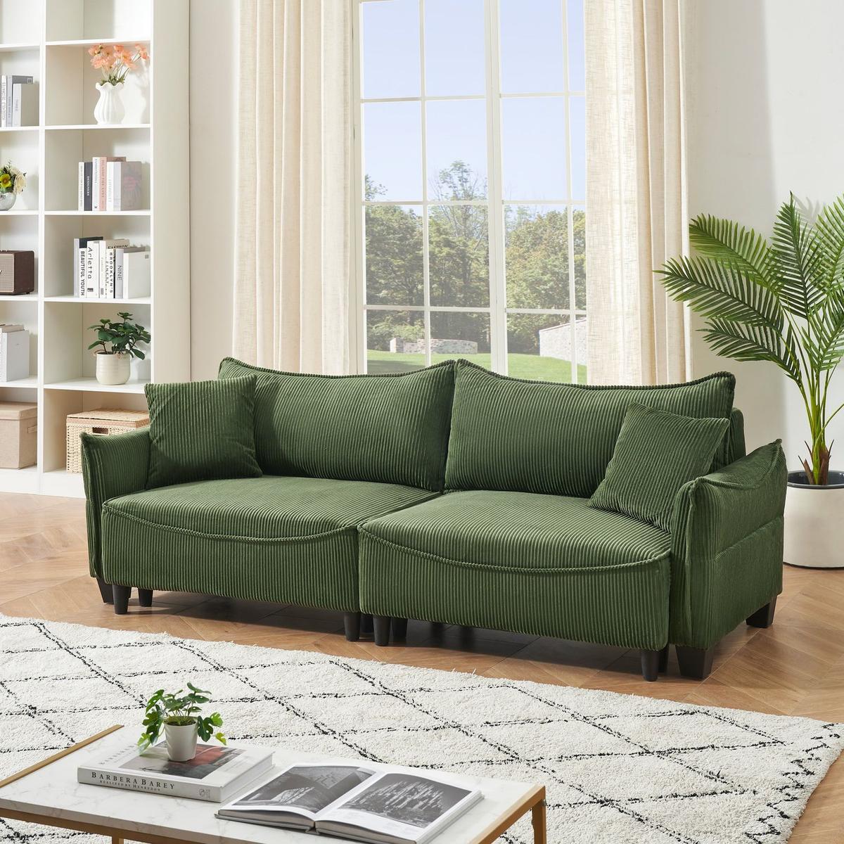 green corduroy fabric, sofa can be converted into a sofa bed with two throw pillows, suitable for living room and other scenes