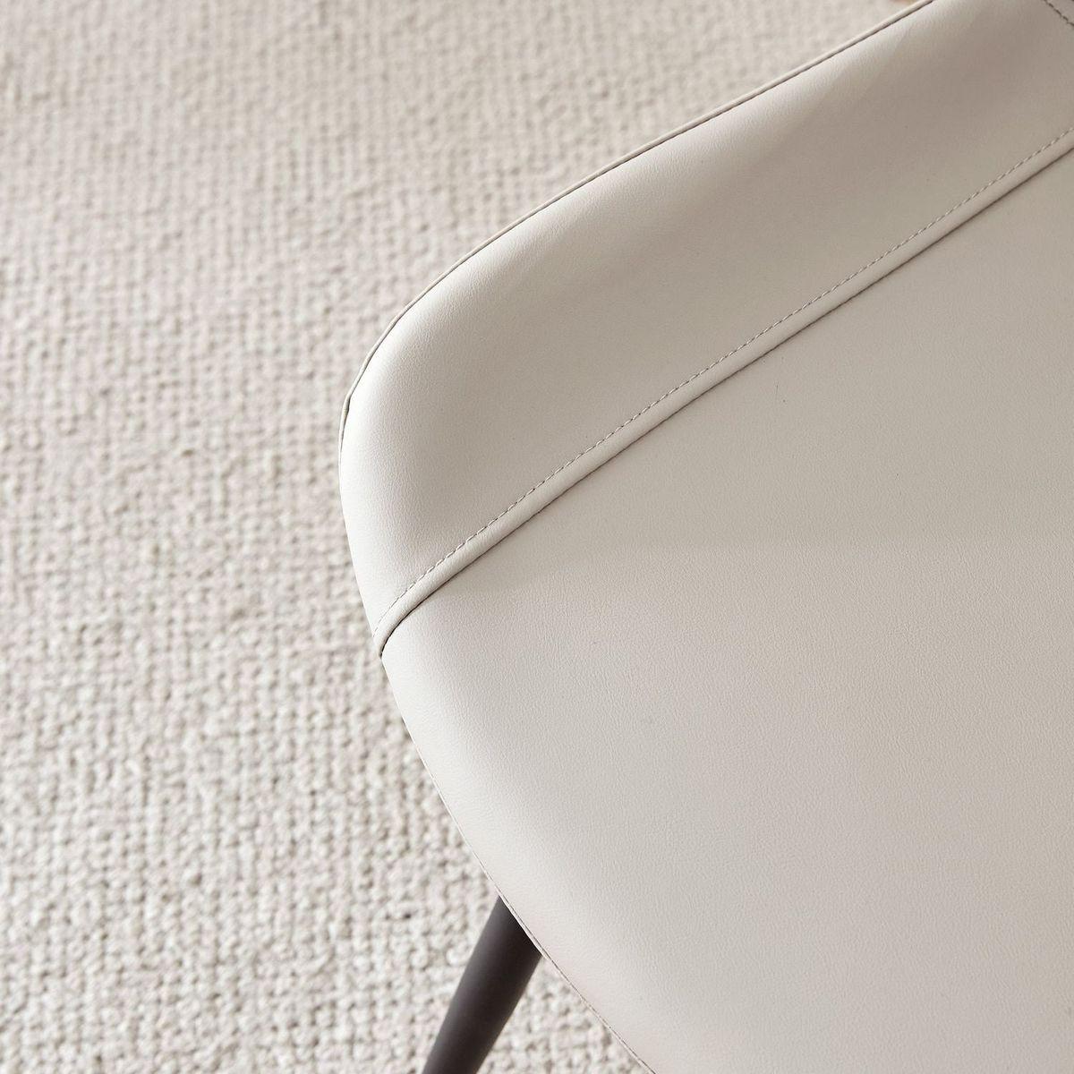 Light gray artificial leather backrest cushion dining chair, black metal legs, curved widened cushion design for more comfort, suitable for restaurants, kitchens, bedrooms, offices.(6 chairs) 0502