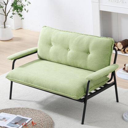 The 53-inch green sofa offers a spacious layout in the small apartment, easily handling various scenarios from watching movies to working