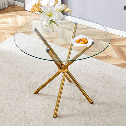 Round clear glass dining table with a unique shape for 4-6 people, with ring-shaped gathered gold metal legs, suitable for desks, kitchens, terraces, dining rooms.