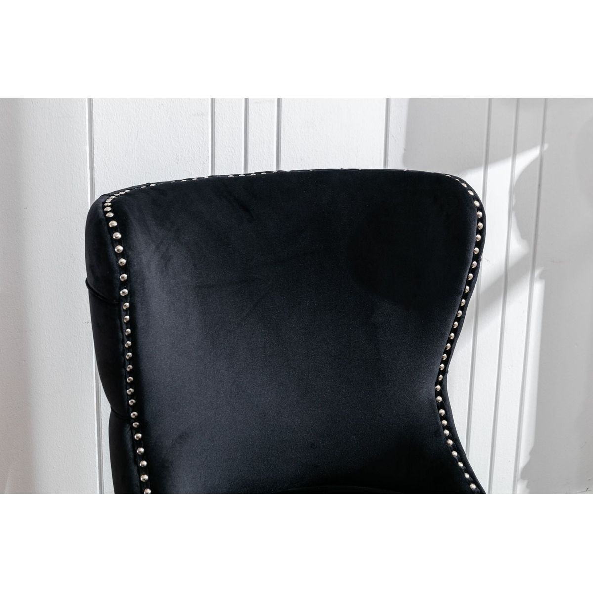 Set of 2 Black Velvet upholstered wing-back dining chair with backstitching nailhead trim and solid wood legs