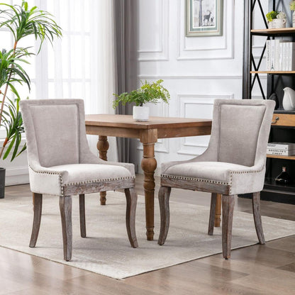 Ultra Side Dining Chairhickened fabric chairs with neutrally toned solid wood legsBronze nail headet of 2eige