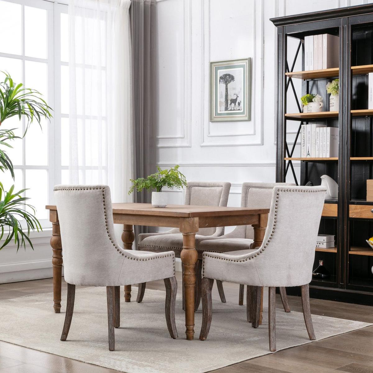 Ultra Side Dining Chairhickened fabric chairs with neutrally toned solid wood legsBronze nail headet of 2eige