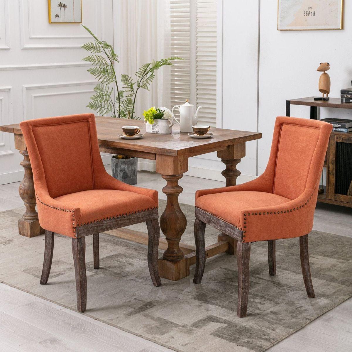 Ultra Side Dining Chairhickened fabric chairs with neutrally toned solid wood legsBronze nail headet of 2range